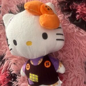 Plush Toy with Purple and White Design